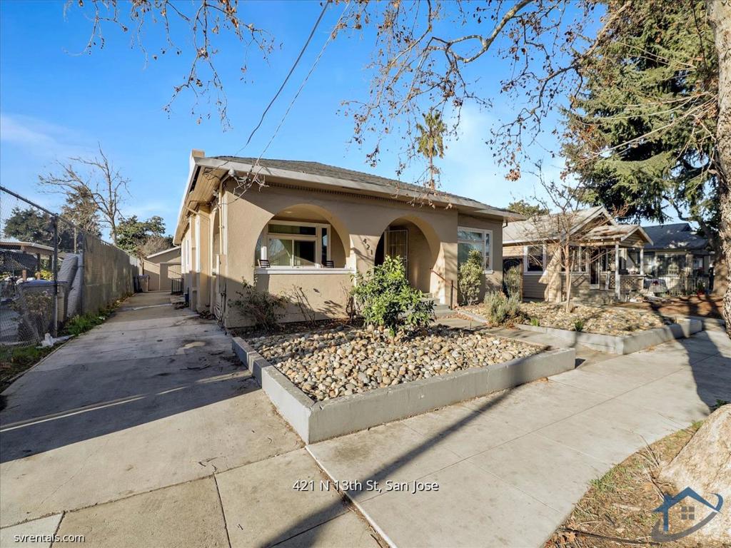 Beautiful home with upgraded kitchen including granite countertops, gas range, large refrigerator, and cabinets. Inside laundry. Main level has 5 bedrooms (two rooms with private bathrooms) plus hallway bathroom. Below ground-level are two suites with full bathrooms, ideal as bedrooms, studio, gym, playrooms, or a large combined apartment. Behind the house is a standalone studio ADU with kitchen and full bathroom. The home is a short walk or bike ride to SJSU. Close to local parks and easy access to Santa Clara Street and all commute routes around the Bay Area, including highways 87, 101, 280, and 680. Large, one-car detached garage for parking, storage, studio, gym, etc. Additional parking is on the street and spaces are usually available nearby. Location and layout are ideal for a group/roommate residence as well as a single-family.