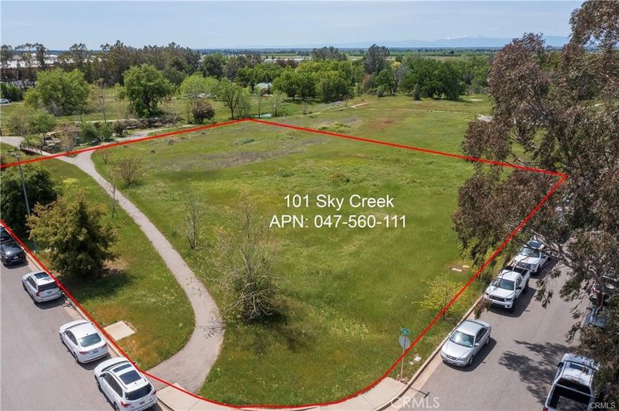 A 1.62-acre parcel zoned for light industrial use is now available for development near the Chico Airport. This well-equipped complex features full public utilities, paved streets, curbs, and gutters. The property also offers scenic amenities, including walking paths and views of a nearby creek. Whether you're looking to build your own facility or invest in a high-potential project, this lot presents a unique opportunity.