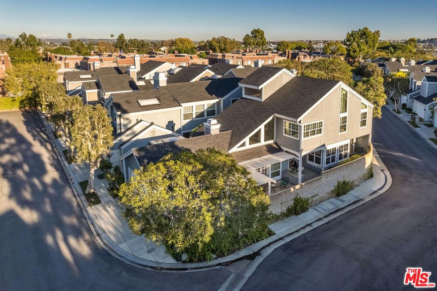 Experience quintessential SoCal living in this beautifully appointed 2-story freestanding home tucked inside a 24-hour guard-gated community. With no shared walls, this single-family style residence offers exceptional privacy on a rare south-facing corner lot. A charming garden patio welcomes you through a private gate, creating a peaceful outdoor retreat. Inside, double front doors open to an expansive, sun-filled living room with fireplace, a generous formal dining room, an eat-in kitchen that leads to private BBQ patio, a dedicated laundry room and an updated powder bath. The first-floor features hardwood floors, classic white shutters, and French doors connecting seamlessly to the patio. Upstairs, a loft overlooking the living room provides the perfect spot for a home workspace. A large second bedroom sits alongside a remodeled full bathroom. The spacious primary suite offers lofted ceilings and ample room for a relaxing sitting area, while the bright en-suite bath includes dual vanities, a walk-in shower, soaking tub, and private WC. Additional highlights include a two-car garage with ample storage, guest parking conveniently located directly across from the home, a seat stairlift to assist up the stairs and the HOA recently installed a new roof. The community features beautifully manicured, park-like grounds, private streets, and desirable amenities such as a pool with bathrooms, tennis courts, pickleball courts, and two spas. All of this is just minutes from beaches, boating, Waterside Shopping Center, restaurants, grocery options, and the best of Marina del Rey. With thoughtful upgrades, this private, hidden enclave offers turnkey living - just move in and enjoy!