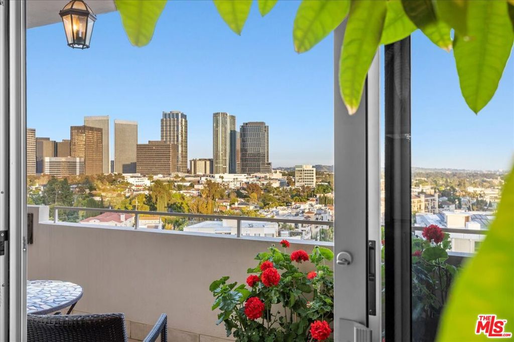 Discover breathtaking panoramic views from Century City to the ocean in this luxurious one-bedroom plus den unit, boasting a spacious open floor-plan with high ceilings and over 1,660 square feet of living space. Located just off the bustling Wilshire Corridor in the elegant Glen Towers, a boutique mid-century modern full-service building, this unit is the epitome of luxury and convenience. The chef's kitchen, large primary suite with large closet, and abundance of storage space, make this unit both functional and stylish. The inside laundry room adds to the modern comforts of home, providing you with everything you need for easy living. Step out from the dining room or primary bedroom to admire the unobstructed view from your balconies, perfect for enjoying a morning cup of coffee or watching the sunset. Whether you are relaxing or entertaining, this space is sure to impress. The building offers a range of amenities, including valet parking, 24/7 security, a concierge/front desk, cable, pool, gym, updated lobby, hallways, and elevators. You'll have everything you need at your fingertips, ensuring you live a luxurious and comfortable lifestyle. Please note, some images have been digitally staged.