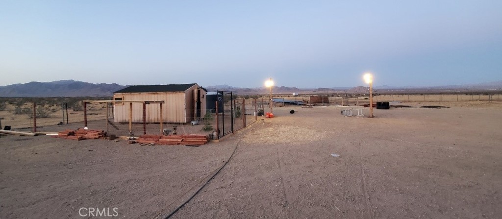 Escape to tranquility on this serene 5-acre parcel in the heart of Lucerne Valley, a haven of peace surrounded by picturesque hills and breathtaking mountain views. Whether seeking a weekend retreat or planning to build your dream property, this spacious lot offers endless possibilities. The property features a convenient water tank and a storage house, making it ideal for immediate use or future development. Just a short drive from the 247 Barstow Highway, this location offers the perfect balance of seclusion and accessibility. The High Desert is booming with growth and opportunity! With Amazon expanding with several warehouses and the Brightline train soon connecting Southern California to Las Vegas, this is an excellent time to invest in this flourishing area. Don't miss this chance to own a piece of this growing desert. Contact a realtor today to schedule a viewing and explore the possibilities!