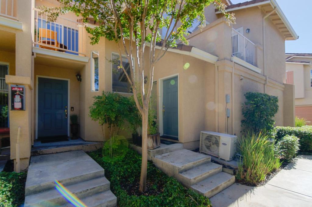 Luxury and Comfort in this Stunning Silicon Valley Condo! Dramatic architecture, high ceilings, picture windows, views & light. Great Room has living area, fireplace, chef's kitchen, dining area, powder bath & leads to balcony/deck for indoor/outdoor living. Spacious & romantic Loft Master Suite with dual vanities. Upgrades include gorgeous hand scraped wood flooring and designer lighting. Attached 2-car tandem garage with washer/dryer *Pool* LOCATION-superb shopping, dining, & freeway access-this is a 10!