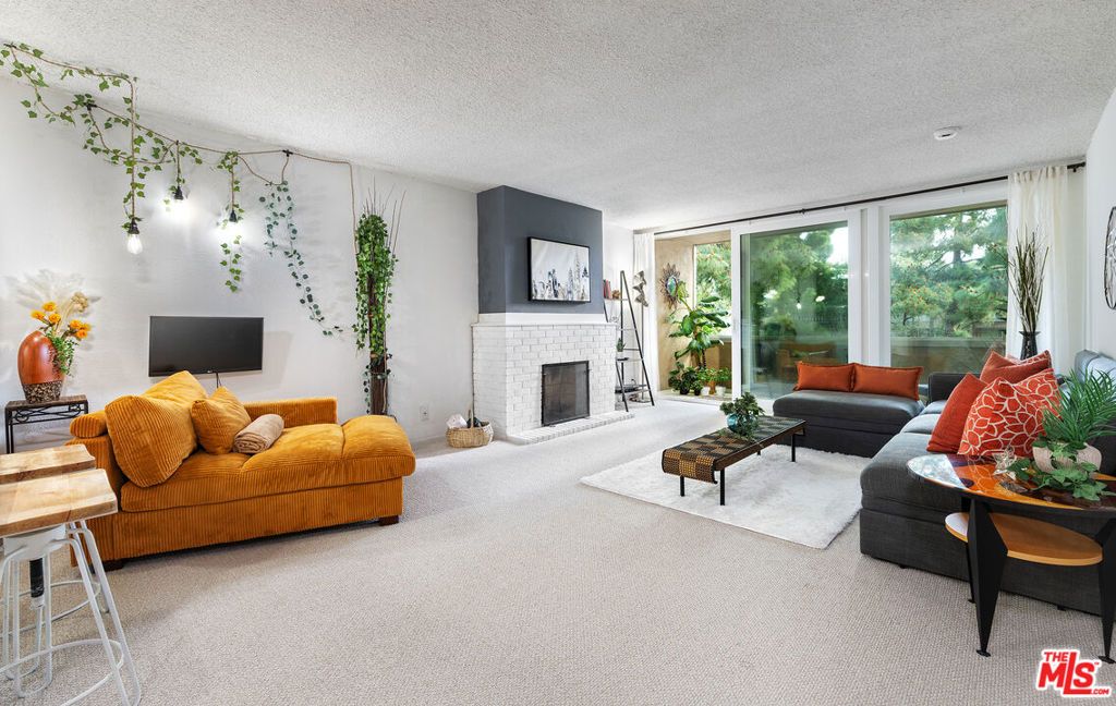 Photo of 6405 Green Valley Circle #209, Culver City, CA 90230 (MLS # 26663497)