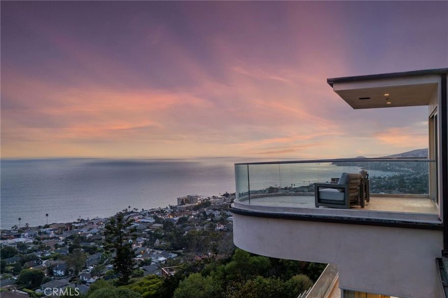 *** MODERN MASTERPIECE WITH UNRIVALED OCEAN VIEWS ***



Perched on a PRIVATE, STREET-TO-STREET LOT at the end of a QUIET CUL-DE-SAC, 900 GAINSBOROUGH DRIVE is a CONTEMPORARY ARCHITECTURAL TRIUMPH offering some of the most BREATHTAKING OCEAN AND CITY LIGHT VIEWS in all of LAGUNA BEACH. Encompassing approximately 4,100 SQUARE FEET across THREE LEVELS, this CUSTOM ESTATE spans TWO ADJACENT PARCELS—presenting a rare opportunity to add a POOL, SPA, OR GARDEN PAVILION overlooking the PACIFIC OCEAN.



Reimagined in a COMPREHENSIVE 2015 REMODEL, the residence blends SOPHISTICATION AND MODERN ELEGANCE, featuring SOARING CEILINGS, WALLS OF GLASS, a SPIRAL STAIRCASE, SMART HOME AUTOMATION, ELEVATOR ACCESS, and SEAMLESS INDOOR-OUTDOOR LIVING that captures PANORAMIC COASTAL VISTAS from nearly every room.



The MAIN LEVEL is anchored by a SHOWSTOPPING OCEAN-VIEW GREAT ROOM, opening to an EXPANSIVE TERRACE adorned with VINTAGE TILE—an ENTERTAINER’S DREAM. The CHEF’S KITCHEN boasts SLEEK MIELE APPLIANCES, CUSTOM CABINETRY, a LARGE ISLAND WITH SEATING, and a WALK-IN PANTRY. Two EN-SUITE BEDROOMS, a FULL GUEST BATH, and a SPACIOUS LAUNDRY ROOM complete this level.



The ENTIRE UPPER FLOOR is dedicated to the OWNER’S RETREAT, a private sanctuary with SWEEPING OCEAN AND CATALINA ISLAND VIEWS. This LUXURY SUITE features a SPA-INSPIRED BATH with DUAL WALK-IN SHOWERS, a FREESTANDING TUB WITH FIREPLACE, PRIVATE SITTING AREA, and a VIEW BALCONY perfect for SUNSET UNWINDING.



The LOWER LEVEL offers REMARKABLE FLEXIBILITY, with a SEPARATE LIVING AREA, FIREPLACE, KITCHENETTE, and PRIVATE PATIO—ideal for a GUEST SUITE, HOME OFFICE, GYM, STUDIO, or MEDIA ROOM.



Outside, MULTIPLE TERRACES AND GARDENS embrace the essence of SOUTHERN CALIFORNIA LIVING. Two SEPARATE 2-CAR GARAGES and EXTENSIVE STORAGE enhance functionality, while its construction on SOLID BEDROCK ensures EXCEPTIONAL STRUCTURAL STABILITY.



Just minutes from WORLD-CLASS BEACHES, SCENIC HIKING TRAILS, UPSCALE DINING, and the CULTURAL CHARM OF LAGUNA VILLAGE, 900 GAINSBOROUGH DRIVE is more than a home—IT’S A LEGACY ESTATE THAT DEFINES COASTAL LUXURY LIVING.