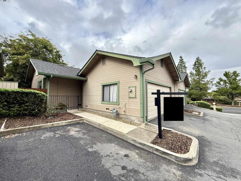 Welcome to this fantastic single-level townhome that truly has it all...SINGLE-STORY, BACKYARD, 2-CAR GARAGE, INDOOR LAUNRY and CLOSE TO WALNUT CREEK! As you step inside, you’ll be greeted by beautiful, engineered wood floors and vaulted ceilings that enhance the home’s spacious, floor plan. The inviting family room features a cozy wood-burning fireplace, perfect for relaxing evenings at home. Two spacious bedrooms including a primary suite. Enjoy the ease of indoor laundry and the comfort of a private, spacious backyard, ideal for entertaining or simply unwinding in your own peaceful retreat. Located just minutes from Walnut Creek, you’ll love being close to shopping, dining, and entertainment, all while enjoying the tranquility of this desirable neighborhood. Offering style, comfort, and convenience, this home is the perfect place for you!