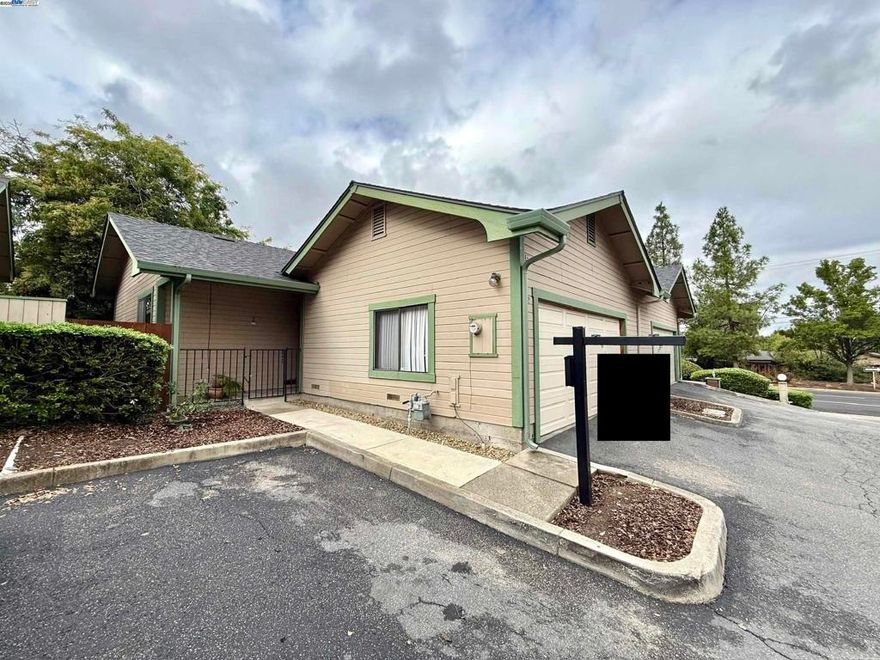 Welcome to this fantastic single-level townhome that truly has it all...SINGLE-STORY, BACKYARD, 2-CAR GARAGE, INDOOR LAUNRY and CLOSE TO WALNUT CREEK! As you step inside, you’ll be greeted by beautiful, engineered wood floors and vaulted ceilings that enhance the home’s spacious, floor plan. The inviting family room features a cozy wood-burning fireplace, perfect for relaxing evenings at home. Two spacious bedrooms including a primary suite. Enjoy the ease of indoor laundry and the comfort of a private, spacious backyard, ideal for entertaining or simply unwinding in your own peaceful retreat.  Located just minutes from Walnut Creek, you’ll love being close to shopping, dining, and entertainment, all while enjoying the tranquility of this desirable neighborhood. Offering style, comfort, and convenience, this home is the perfect place for you!