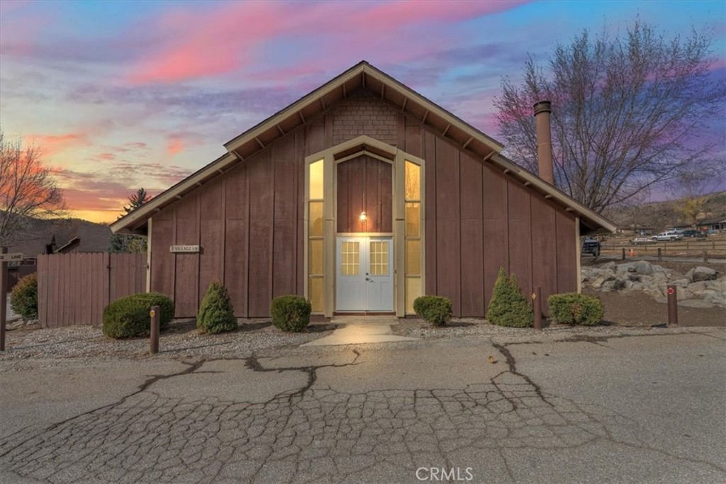 Welcome to this charming condo located in the serene and private gated community of Bear Valley Springs. This highly desirable corner-lot property boasts a spacious layout with vaulted ceilings and a freshly painted interior, creating a bright and welcoming atmosphere. Featuring two bedrooms and two bathrooms, which includes a primary suite for added privacy , this single-story home is designed for comfort and convenience. The open-concept U-shaped kitchen connects seamlessly to both the dining room and living room and includes a breakfast bar for casual meals or entertaining. A cozy corner fireplace adds warmth to the living space, making it perfect for relaxing evenings.
Step outside to your private fenced patio, ideal for enjoying a quiet night under the stars in privacy. This home also includes central AC for staying cool on warm summer days. A covered carport with additional storage offers practicality and convenience. Living in Bear Valley Springs means enjoying a vibrant community with exceptional amenities, such as a pool, restaurants, equestrian facilities, sports courts, multiple lakes, and more. Renowned for its stunning views and tight-knit community, Bear Valley Springs offers a lifestyle like no other. Don't miss this opportunity to make this wonderful property your new home!