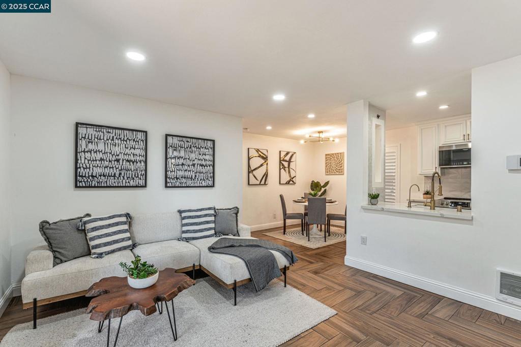 Updated Ground-Floor Condo | Balcony Compliant | Beautiful quiet community Welcome to 665 Dartmore Ln #155 — a beautifully updated 2-bed, 2-bath ground-floor unit offering 906 sqft of modern comfort in a secure Hayward community. Enjoy a bright open layout, remodeled kitchen with quartz counters, farmhouse sink, and stainless appliances, plus updated bathrooms, in-unit laundry, private patio, and 2 assigned parking spots (1 covered). Balcony inspection compliant— full reports included in disclosures for buyer peace of mind. Resort-style amenities: pool, spa, gym, clubhouse, near parks with tennis courts, and walking trails. Minutes to BART, I-880, and San Mateo Bridge. Priced at $538,000— Move-in ready and commuter-friendly! -