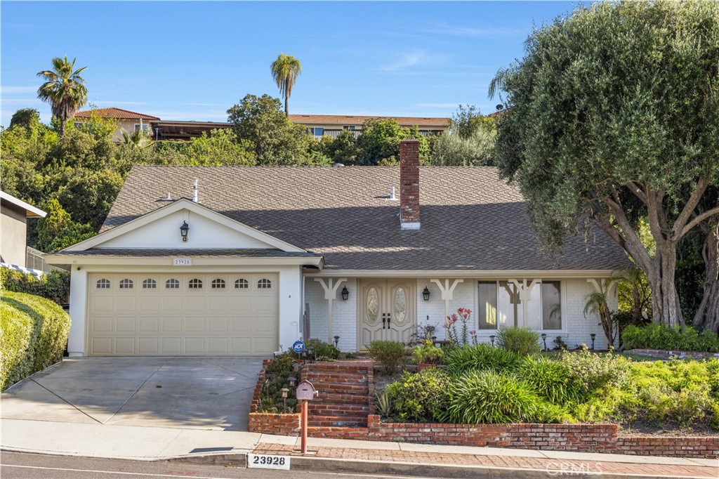 Welcome home to 23928 Sunset Crossing in the desirable Diamond Point Community! With 4 bedrooms and 2 full bathrooms, this 1,859 sq ft residence offers comfort, style, and privacy. Enjoy a spacious living room with a cozy fireplace and sliding glass doors that showcase views of your backyard retreat — complete with a pool, spa, and private hillside. The kitchen features quartz countertops, stainless steel appliances, and a double oven, perfect for entertaining.. The downstairs bedroom is currently used as a second master suite, with its own bath and private slider to the pool and jacuzzi. Tasteful upgrades include newer flooring and fresh paint. Enjoy hillside views from the front yard and total seclusion in the back. As a resident of the Diamond Point, you’ll have access to tennis courts, a community pool & spa, and a clubhouse for gatherings. LOW HOA! Come quick!