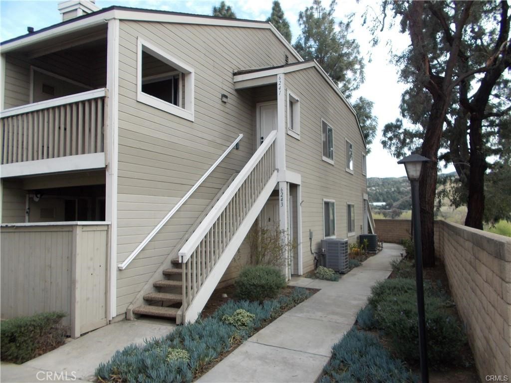 Beautifully updated 3-bedroom, 2-bathroom, 2-car garage home located close to Savi Ranch shopping center. Newer wood and carpet flooring, Designer paint colors, and recessed lighting are just some of the nice modern touches. Featuring a cozy fireplace. Light & bright updated kitchen with lots of cabinets. Recently remodeled bathrooms. Master bedroom with vaulted ceilings. Bedrooms and family room with ceiling fans, a Newer A/C unit. Laundry on the balcony includes a washer and dryer!!! The community has a pool & spa, playgrounds, BBQ areas, and more
