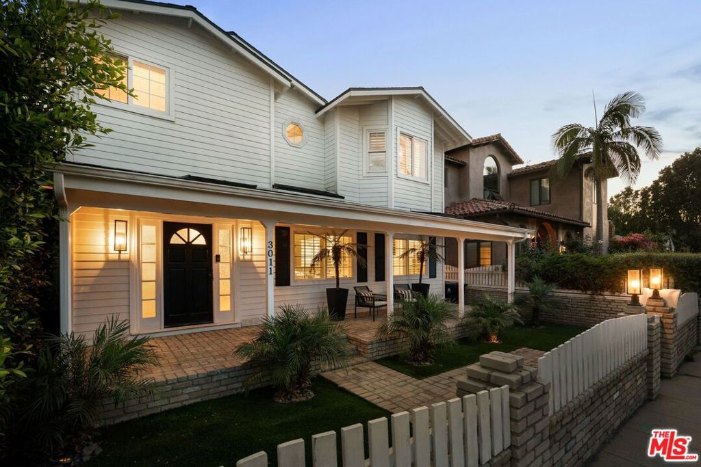 Enjoy the best of modern living and relaxed coastal charm in this beautifully updated Venice property, just three blocks from iconic Venice Beach. This versatile residence includes a spacious 4-bedroom, 3.5-bathroom main home and a thoughtfully renovated 1-bedroom, 1-bathroom ADU, ideal for extended family, guests, or rental income. The main home features an open, light-filled layout with seamless flow between the living, dining, and kitchen areas--perfect for everyday living and casual entertaining. The kitchen is equipped with contemporary cabinetry, generous counter space, and smart appliances that combine style and function. Two primary suites--one on each level--offer comfortable retreats with private en-suite bathrooms. The additional two bedrooms share a Jack-and-Jill bathroom, offering flexibility for a range of lifestyles. Multiple outdoor areas expand the living space and provide great spots to relax or gather with friends. The separate ADU, completed in 2022, adds to the property's appeal with polished concrete floors, its own laundry, modern finishes, and large folding patio doors that open to a private outdoor area--ideal for dining, lounging, or enjoying the hot tub. Located in the heart of Venice, you're close to local shops, restaurants, and the beach, making it easy to enjoy everything this vibrant neighborhood has to offer. This is a rare opportunity to own a flexible and well-appointed property in one of Los Angeles' most desirable coastal communities.