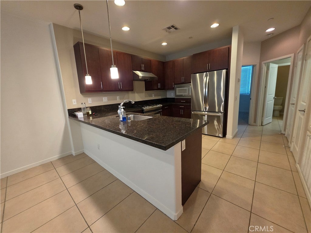 1568 W Artesia D