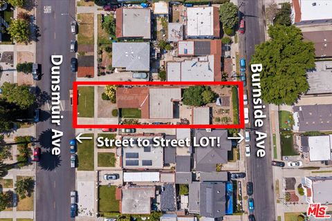 Photo of 2435 S Dunsmuir Avenue, Los Angeles, CA 90016 (MLS # 25566697)