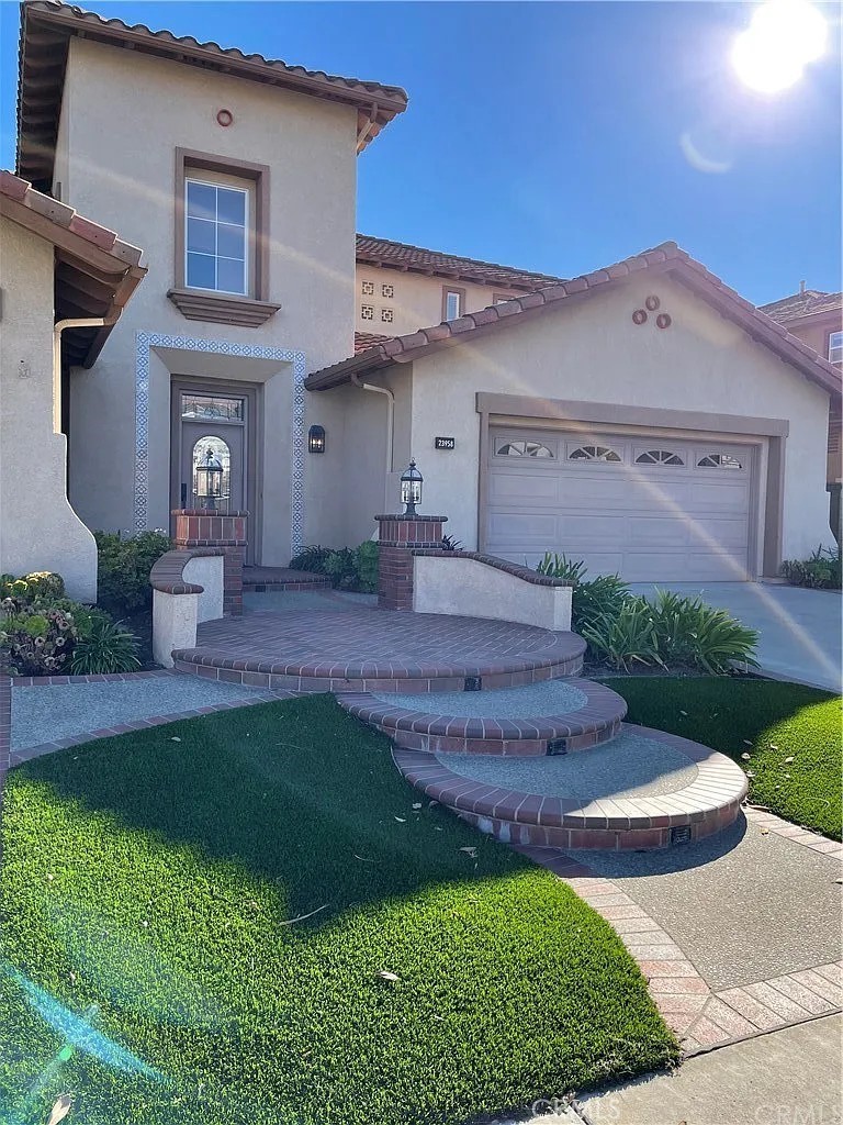 Welcome to this beautiful FIVE bedroom/FOUR bathroom, incredible canyon view home, located on a cul-de-sac in the highly desired guard gated community of Stoneridge. This home features a dramatic foyer, cathedral ceilings, spiral staircase, spacious living and family rooms, cozy fireplaces, gourmet kitchen, formal dining room, downstairs bedroom with full bathroom, large master suite with balcony, three car garage, all on an oversized view lot! With award winning schools, Mission Viejo Lake privileges, hiking/biking trails, nearby shops & restaurants, freeway/toll road and beach close, this wonderful home is sure to be snatched up quickly.