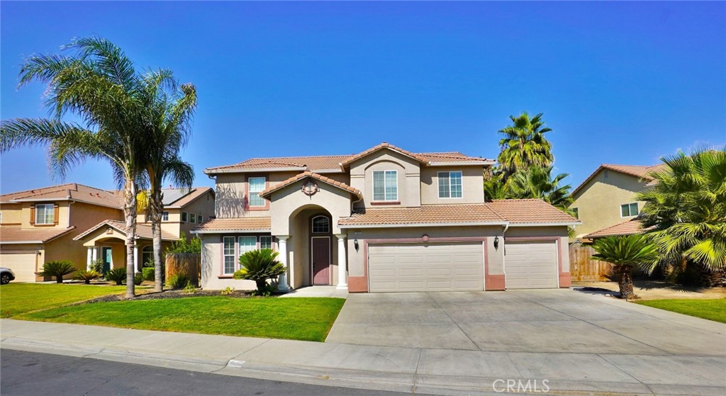 Located just steps from the golf course in the desirable Lemoore Country Club Estates, this stunning 2-story home offers 2,694 sq ft of beautifully designed living space with 4 bedrooms, 3 full bathrooms, and an upstairs loft—perfect for a home office, game room, or second living area. The home features a formal living/dining room, a generous kitchen with a breakfast bar, nook, and abundant cabinetry, plus a cozy den with a fireplace. One bedroom and a full bath are conveniently located on the main level. Step outside to your own private oasis with a sparkling swimming pool, built-in BBQ gazebo with granite countertops, sink, and plenty of space for outdoor dining and entertaining. Potential RV parking and a 3-car garage, give you room for all your toys and tools. Near major highways for easy commuting throughout the Central Valley, this home combines location, size, and amenities for a lifestyle of comfort and convenience. Put this home at the top of your list. It won’t last long!