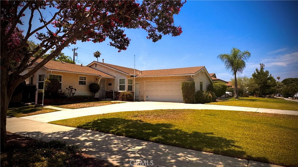 This well maintained, 4 bedroom 2 bath single story home, in a nice well established neighborhood, has been recently painted inside, and has a lot of new flooring. Over the years there was a large 297 sq. ft. addition (family room) The current owners have taken care of this property for over 40 years, making many improvements during that time. (removed existing rain gutters and replaced with seamless gutters all around in 2014, Installed a Plumbing clean-out riser in the back yard in 2014, Installed Lorex Cameras, front and back in 2018, Installed Ring doorbell system in 2018, Replaced hot water heater in 2020, New efficient 4-ton Heating and Air Conditioning System in 2021, Replaced fresh water piping with copper throughout the house in 2021, Replaced 4 circuit breakers in Sub panel on patio in 2022, replaced 11 windows and new patio door with Milgard double pane windows in 2000, and replaced sliding door in office and window to patio in 2005.) The generous 8448 sq. ft. lot corner has back yard entry for RV or boat. There is a large covered patio also for outdoor back yard enjoyment. There is also a front yard circular driveway. Conveniently located near shopping, schools, parks and major freeways. Buyer to satisfy themselves regarding condition, lot size, and square footage.