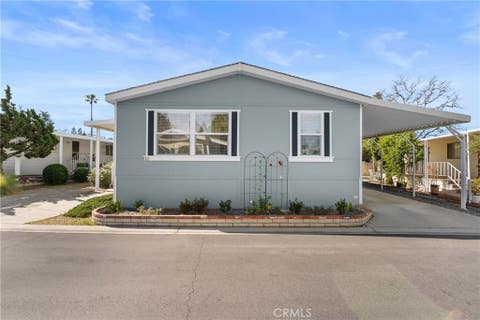 Photo of 24001 Muirlands Blvd #12, Lake Forest, CA 92630 (MLS # OC26045196)