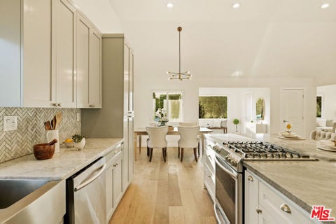 Photo of 1026 S Windsor Boulevard, Los Angeles, CA 90019 (MLS # 26772117)