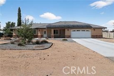 Photo of 20726 Nisqually Rd, Apple Valley, CA 92308 (MLS # IG26094907)