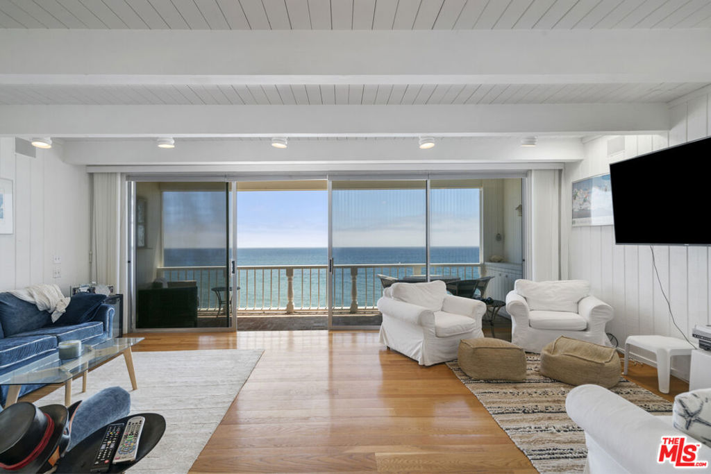 Surf Sand Sun... The Malibu Mystique. Escape to your private beachfront home for the summer! Complete with breathtaking views of the mighty Pacific. Watch the dolphins close in as you sip champagne at dusk or coffee at dawn. This place is your own private sanctuary, off the busy PCH in a beautifully manicured gated community with private pool and spa. The home, with nostalgic finishes, comes completely designer furnished and features a sumptuous master retreat, televisions, an entertainers dream kitchen and living area, huge closets, private laundry, and a two car private covered parking. And whats more... not only is it ten minutes from Broad Beach and the chic Trancus Shopping center but only twenty minutes from downtown Malibu and Nobu. Easy access to the private airport in Camarillo! This is a real jewel box. Bring your favorite beach chic outfits or a few pair of comfy-cozy sweats and shelter safely on your very own private Malibu beach! Call now before its gone!