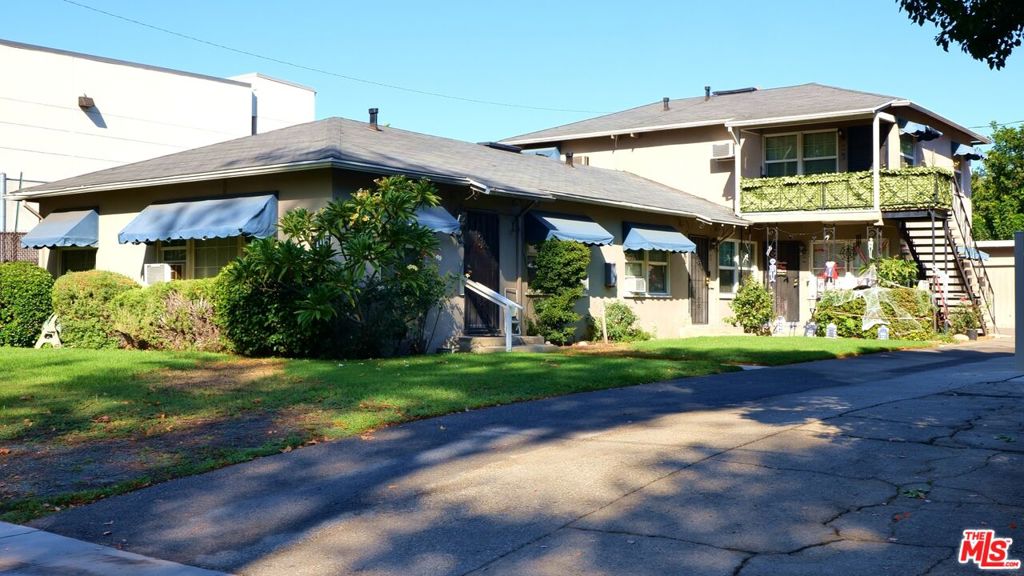 Presenting an exceptional opportunity to acquire a well-positioned 4-unit income property in the heart of Burbank. More than just a building, 1105 Clark Street offers the Heart of the Community, a unique blend of lifestyle appeal and robust investment potential designed to anchor the Core of Your Portfolio. This offering is a strategic acquisition to Secure Your Legacy. Located in a highly desirable, tree-lined neighborhood, this property benefits from its immediate proximity to top-tier amenities, including the renowned Walt Disney Elementary School and lush local parks. This A+ location translates directly into high tenant desirability and low vacancy rates. The property features a versatile unit mix of two 2-bedroom units and two 1-bedroom units, a four-car garage, and a laundry room with coin-operated machines for additional income. This asset also presents a compelling opportunity for future growth, as it may be an excellent candidate for SB 1211, offering savvy investors the potential to explore expansion or development. This is a rare chance to acquire a foundational asset in one of Southern California's most desirable markets.