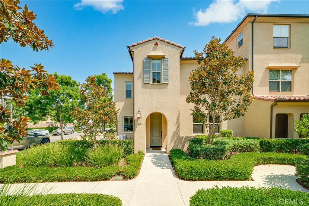 * Premium End-unit * located in the sought-after village of Portola Springs in Irvine. This charming beautiful home offers lots nature light. Impeccably maintained with open floor plan concept features laminated flooring through 1st floor. Upgraded kitchen includes stainless appliances, large island, granite countertops, tile backslpash and white shaker cabinets with glass doors. The dining area seamlessly opens the Great Room with sliding door to the front courtyard is ideal for entertainment. Upstairs features the primary suite, 2 spacious bedrooms and hallway bathroom. Convivence upstairs laundry space. The 2-car attached garage with epoxy floor and overhead storage racks for extra storage. Conveniently located with walking distance to one of Portola Spring Community center. Nearby shopping, dining, and entertainment. This home is also within the highly acclaimed Portola High School. Enjoy the community many amenities include pool, spa, sport courts, BBQ, playgrounds, and parks.