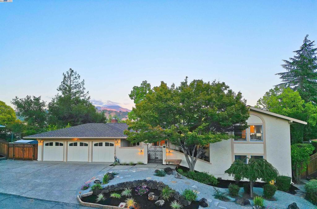 Fabulous Mt. Diablo view lot up a private lane. No street noise. Within a few blocks of Roundhill Country Club. 4 bedrooms, 2.5 baths, 3 car garage. Only one step to home from garage. Updated kitchen and baths. New vinyl flooring family room and dining room. New carpet and baseboards in bedrooms. Kitchen with soft close cabinets, granite slab counters, undermount lighting. Dual pane double hung windows and sliders. Washer, dryer, refrigerator, outdoor barbecue, shed, weather meter, included. New landscaping, level backyard area with large grass area, plus patio for outdoor dining while enjoying the awesome view. Clear pest report section 1- and one-year roof repair warranty No HOA. More pics to follow.