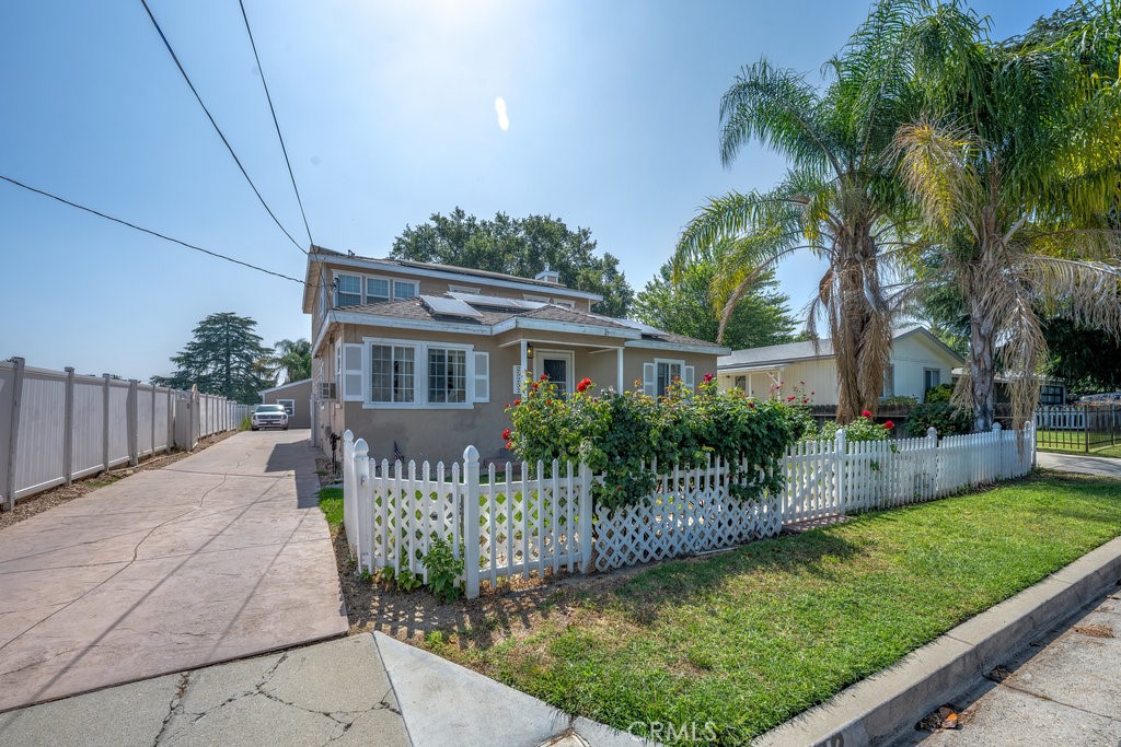Charming Multi-Generational Oasis with Pool and Dual Living Spaces! Welcome to your dream home! The perfect opportunity for first time investors or homeowners to cut down their total mortgage with owner user opportunity and collect rent on other units. This stunning 2 structure opportunity- front building- 2,262 SF and back building 538 SF, with a total square footage of 2,810 SF residence is perfectly designed for modern living, featuring a spacious front unit mother-in-law suite of 772 square feet, middle 2 story home of 1,500 square feet and a detached 538 square foot accessory dwelling unit (ADU). Ideal for families seeking flexibility, this property offers the perfect blend of comfort, privacy, and convenience. Main Home Highlights:** Approximately 1500 SF, bright and airy open concept living area, perfect for entertaining and family gatherings. Well-appointed kitchen with modern appliances, ample counter space, and a cozy dining area. Two generously sized bedrooms upstairs, including a serene master suite with an en-suite bathroom. Beautifully landscaped backyard featuring a sparkling pool, perfect for summer fun and relaxation. Currently rented for $3225. Mother-in-Law Suite - An approximately 772 square foot private retreat with its own entrance, this spacious suite includes 2 comfortable bedrooms, a full bathroom, and a kitchen, laundry, making it perfect for guests, extended family, or as a rental opportunity. Currently rented for $2100 Detached ADU This charming 538 square foot unit offers endless possibilities! Use it as a home office, art studio, or additional rental income. Complete with its own bathroom and kitchenette, it provides the ultimate in privacy and versatility. Currently rented for $2225 Outdoor Paradise Step outside to your own personal oasis! The inviting pool is surrounded by a beautifully landscaped yard, perfect for sunbathing, barbecues, and outdoor gatherings. Located in a desirable neighborhood, this property is close to schools, parks, shopping, and dining, making it a perfect fit for families and investors alike. Don’t miss out on this rare opportunity to own a versatile home that accommodates your lifestyle needs. Schedule a showing today and discover the endless possibilities this unique property has to offer!