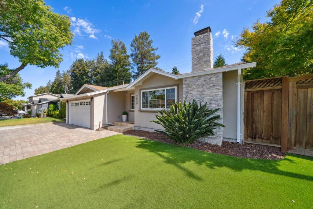 Welcome to 2530 Forbes Drive, a beautifully updated 3-bedroom, 2-bathroom home in Santa Clara. Featuring 1,648 sq ft of living space on a 6,440 sq ft lot, this property offers modern comfort and style with fresh interior paint, luxury vinyl plank flooring, recessed lighting, and a Nest thermostat. Gourmet kitchen boasts S/S appliances: Bosch gas stove, Whirlpool French door refrigerator, GE microwave, granite countertops, designer backsplash, double sink, and built-in wine rack. The spacious living area offers a modern tiled fireplace, while the extra-large family room is highlighted by vaulted ceilings, skylights, overhead fan, Doors leading to the yard, and abundant natural light. The primary suite includes a sleek bathroom with a tiled shower stall, vanity with bowl sink, and modern finishes. The updated hall bathroom features a modern vanity, tile flooring, and a tiled shower over tub. Additional bedrooms include recessed lights, overhead fans, and blinds. Outdoor living is made easy with a paved patio and low-maintenance AstroTurf yard, plus Space for Potential ADU. Conveniently located near major highways, parks, shopping, dining, Santa Clara University, and top employers like Apple and Nvidia, this move-in ready home combines comfort, style, and prime Silicon Valley living