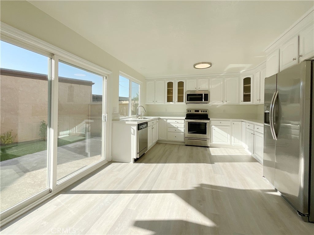 Photo of 22975 CAMINITO OLIVIA #53, Laguna Hills, CA 92653 (MLS # OC26214648)