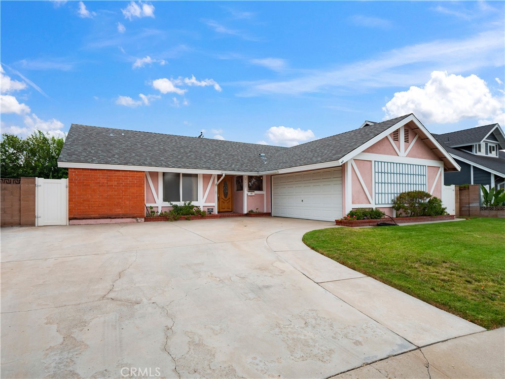 Welcome to this charming 3 bed, 2 Bath, Single-Story Saugus Pool Home on a Desirable Cul-de-sac! The inviting living room features a cozy fireplace and a sliding glass door that opens to the backyard, creating a seamless indoor-outdoor living space. The open eat-in kitchen and separate dining room makes for a great entertainer’s home. Enjoy three well-appointed bedrooms, including a spacious primary suite, and two full bathrooms. Step outside to your private backyard complete with a covered patio and sparkling pool—perfect for relaxing or hosting gatherings. Additional highlights include a 2-car garage, oversized driveway, located near restaurants, award-winning schools, Central Park and much more! Don’t miss your chance to make it yours!