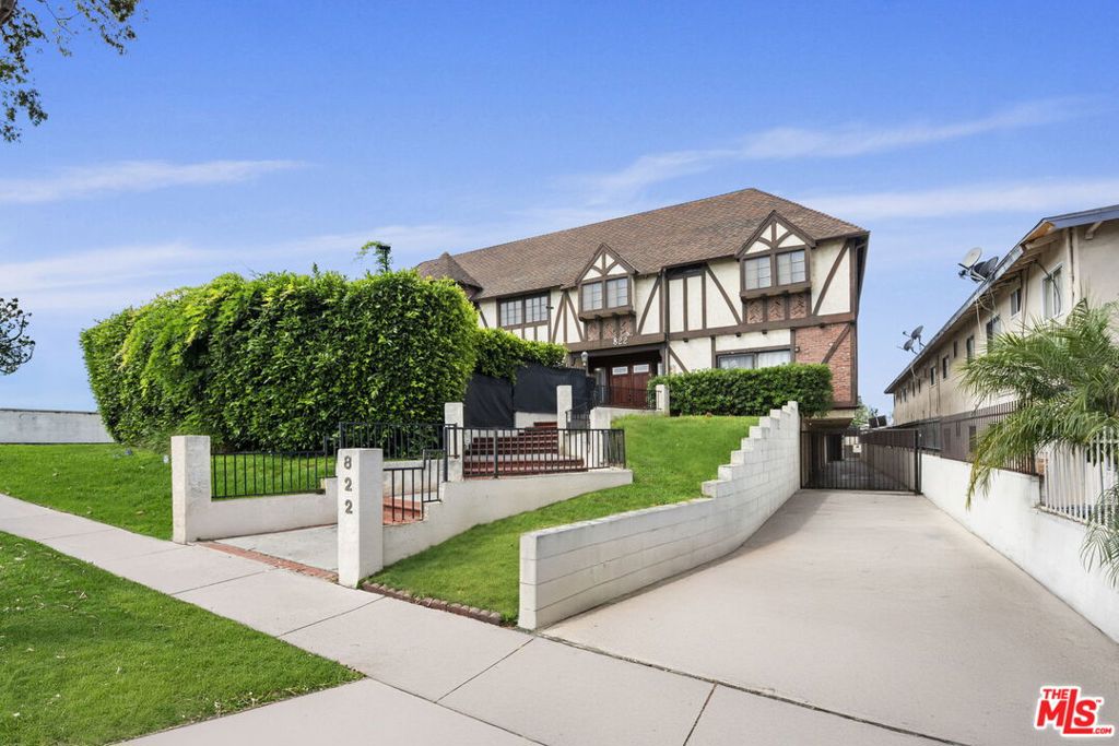 This bright and private corner-unit townhouse-style condo offers exceptional comfort in a gated North Inglewood community. Tucked at the back of the complex, it enjoys added privacy, abundant natural light, and only one shared wall. Thoughtfully updated with fresh interior paint, new carpet, and a refreshed kitchen featuring painted cabinets and stone countertops, the home blends style with functionality. Enjoy two spacious patios one in front, one in back perfect for relaxing or entertaining. The main level includes a convenient half bath, while upstairs features dual primary suites, each with its own full bath. Additional highlights include central heat and air (with a new furnace installed in December 2024) and two side-by-side parking spots. Community amenities include a pool, spa, and secure entry all just minutes from shopping, dining, parks, and SoFi Stadium.