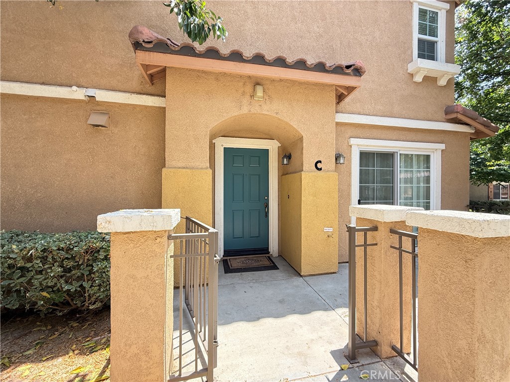 Welcome to this beautifully updated two-story condo located in the desirable gated community of Palacio de Oro South in Rancho Belago. Updated two-story condo with fresh paint and brand-new LVP flooring throughout. Features include 3 bedrooms, 3 full bathrooms, a two-car garage, and a small fenced patio. The kitchen has a pantry, and there's extra storage under the stairs. Refrigerator, washer, and dryer included (no warranty). Located in a gated community with access to Moreno Valley Ranch amenities: lake, pool, fitness center, and park. Walkable to shopping & dining. Very close to Kaiser and RUHS. Rancho Belago is a sought-after area known for its newer developments, community feel, and proximity to major roadways, schools, and parks. Ideal tenant will have income 3X rent amount, good credit, no evictions/BK, bank statement to show first month and security deposit. This is a non-smoking/vaping property. Pet's will be considered on a case by case basis.
