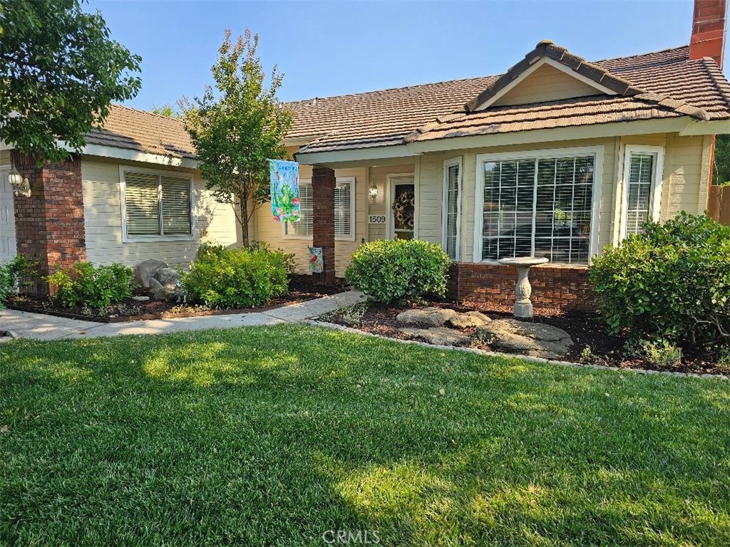Price Adjustment! Motivated Seller – Bring All Offers! This spacious and well-cared-for 3-bedroom, 2-bathroom home offers 1,765 sq ft of single-level comfort and charm, ideal for families or anyone looking for move-in-ready convenience and resort-style outdoor living. Step inside to find a bright and open floor plan, featuring a large family room with a cozy gas fireplace, perfect for family nights or entertainment. The updated kitchen includes stainless steel appliances – gas stove, microwave, dishwasher, refrigerator (all stay), a breakfast bar with mounted TV and seating, and a generous dining area that flows beautifully for indoor entertaining. The primary suite includes a newly remodeled shower, and all bedrooms feature laminate flooring throughout! The indoor laundry room has plenty of storage cabinets, and both the washer and dryer stay. A built-in Murphy bed in one of the bedrooms adds functionality and convenience. Outside, discover a true backyard oasis designed for both relaxation and recreation. Enjoy a covered 90 sq ft gazebo, an additional 90 sq ft pergola, both with outdoor ceiling fans, perfect for outdoor dining or lounging. The refreshing pool includes a removable safety fence, ideal for kids and pets. The low-maintenance landscaping is both aesthetically pleasing and pet-friendly, and the yard includes 4+ storage sheds for tools, toys, or hobbies. All patio furniture is included! Additional features: Newer AC unit, electric water heater with drip pan, insulated garage door, tile roof, automatic sprinkler system, window and door weatherization, smart meter, and recent AC service. All window coverings stay. This home is packed with value and thoughtful upgrades—schedule your private showing today and make it yours!