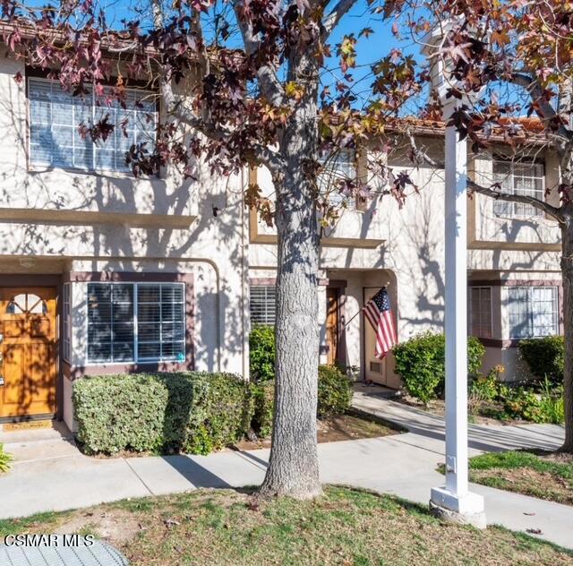 This tri-level townhome offers a remarkable opportunity to rent this newly redone sought-after neighborhood. Renowned for its top-rated Las Virgenes School District. Spacious living room with high ceilings, a cozy corner fireplace with lovely patio, creating an inviting space for relaxation and entertainment. Spacious dining area with ceiling fan and light. Kitchen is equipped with appliances: stove, dishwasher, microwave and refrigerator. The primary suite includes high ceilings, a balcony walk-in closet, and an en-suite bathroom with dual vanity with oversized shower. 2nd Bedroom suite offers sliding door closets and private bathroom. Indoor Outdoor living is enhanced by a first floor. Stackable washer dryer. 2 car garage detached. Recent upgrades including new laminate flooring, smooth ceilings, appliances, counters, lighting, and paint throughout. Residents of this exclusive community enjoy access to a pool and spa. This unit is just across the street to restaurants, (Mexican, Thai, Pizza, Kabob), Market with Liquor & wine store, Groomers, Laundromat, Hair salon & Urgent Care. Enjoy a short drive just minutes from the beach and located within the esteemed Las Virgenes School District. This move-in-ready townhome combines modern updates with timeless charm.
