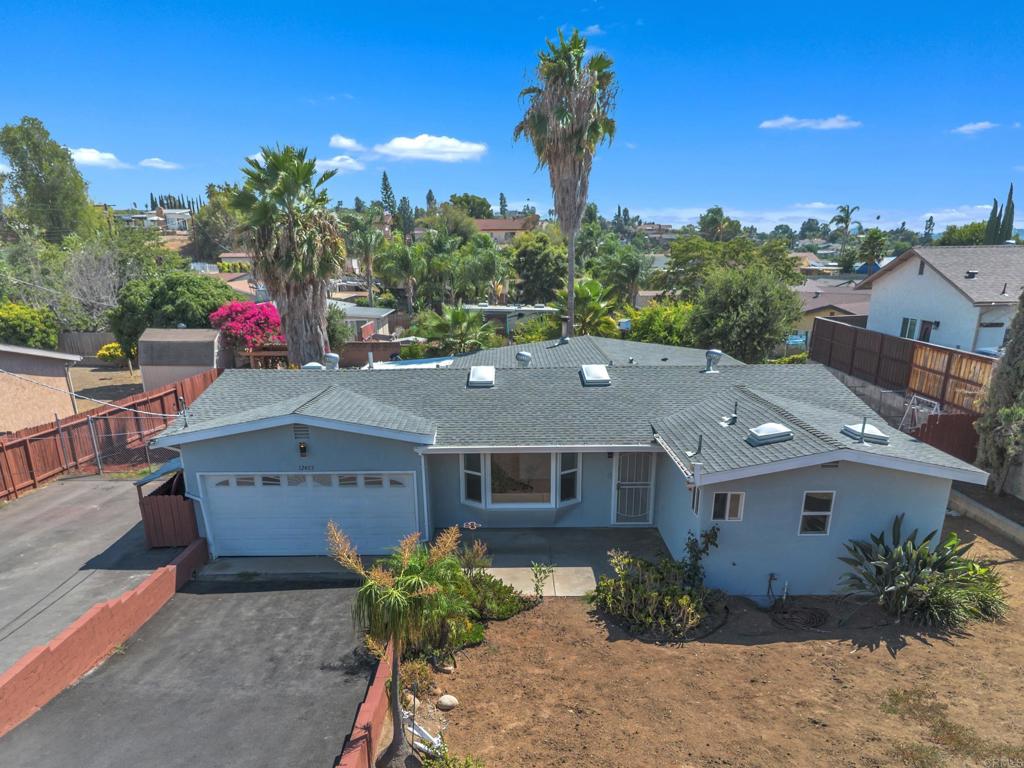 Beautifully renovated and move-in ready! This spacious 3-bedroom, 3-bathroom home sits on a large 13,899 sq ft lot and offers 1,898 sq ft of modern living space. Recent upgrades include new flooring, fresh interior and exterior paint, and recessed lighting. The home features two generous primary suites, each with its own full bathroom. A total of three full bathrooms offer comfort and flexibility for any living arrangement. Additional highlights include a dedicated laundry room, an open-concept layout, and plenty of natural light. Step outside to a large backyard with a deck ideal for entertaining or relaxing. Explore the potential for an ADU, Duplex, or additional outdoor living space. Conveniently located near shopping, dining, and freeway access, this home combines style, space, and location.