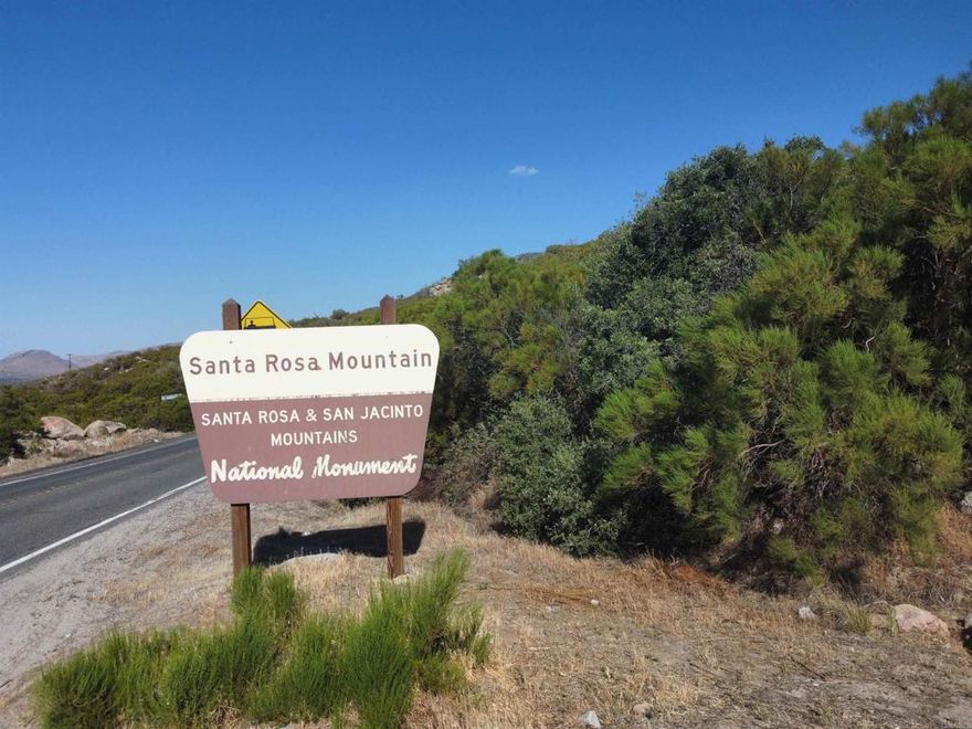 Own a Once-in-a-Century Opportunity in the Santa Rosa & San Jacinto Mountains  Discover a rare chance to own a remarkable piece of California history — approximately 280 acres of pristine, undeveloped land that hasn’t been on the market in over 100 years. This incredible property shares a boundary with the San Bernardino National Forest and is surrounded by natural beauty, including nearby campgrounds, hiking and horse trails, and even a natural spring with its own faucet — a rare and valuable feature. With breathtaking forest views perfect for picturesque photoshoots, the setting offers endless possibilities.  Nestled within the awe-inspiring Santa Rosa & San Jacinto Mountains National Monument, this expansive high-desert parcel offers unmatched panoramic vistas, dramatic topography, and total privacy. It’s an ideal site for a secluded estate, off-grid retreat, eco-lodge, or conservation investment.  Accessible via Forest Route 7S02, the property is perfectly situated near some of Southern California’s most desirable mountain and desert destinations. Just 15 minutes away is the charming village of Idyllwild, known for its pine-lined streets, vibrant music scene, local cafés, galleries, and seasonal festivals. A 25- to 30-minute drive leads to Palm Desert, where you’ll find luxury shopping along El Paseo, championship golf, fine dining, and resort amenities. Agua Caliente Casino is also nearby, and Palm Springs International Airport is just an hour away for easy access.  Outdoor enthusiasts will love the proximity to scenic byways along Highways 74 and 243, the iconic Pacific Crest Trail, Lake Hemet’s fishing and camping, and an endless network of trails for hiking, biking, and horseback riding.  Surrounded by federally protected land and natural beauty in every direction, this one-of-a-kind property offers the rare combination of seclusion, scale, and proximity to key amenities. A blank canvas in one of California’s most stunning and untouched landscapes — ready for your vision.