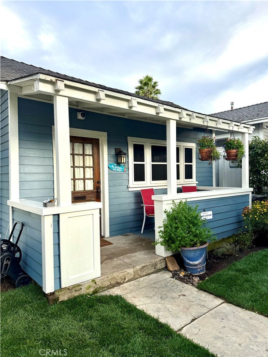 Here’s your opportunity to own a piece of Redondo Beach history — Designated Historical Landmark No. 65 — offering property tax benefits under the Mills Act. Built in 1912 by Vincent Burnham, this timeless coastal bungalow reflects the classic architectural character of early Redondo Beach and was originally envisioned as part of an informal compound alongside its neighboring properties.



Beyond its storybook curb appeal, this home offers versatility and authentic charm on one of South Redondo’s most picturesque tree-lined streets. Framed by a white picket fence and surrounded by lush landscaping, the residence blends historic detail with the relaxed spirit of beachside living — just blocks from the Redondo Beach Pier and Torrance Beach.



Inside, the main home features two bedrooms and one full bath, a light-filled living room with warm wood accents, and a sunny kitchen that opens to the backyard for easy indoor-outdoor flow.



The two redesigned carriage houses provide additional living space or ample storage units, each with its own entrance and flexible layout — ideal for a home office, creative studio, guest suite, gym, or personal retreat. Both are spacious and currently used as studios. Recent improvements include a brand new foundation in the main house completed 11/11/2025, a new tankless water heater for the rear carriage house, new sod and irrigation system in front yard and completion of termite work.



Combining historic charm, modern functionality, and a highly sought-after South Redondo location, 222 S Broadway presents a rare opportunity to own a landmark property and experience the best of coastal living.