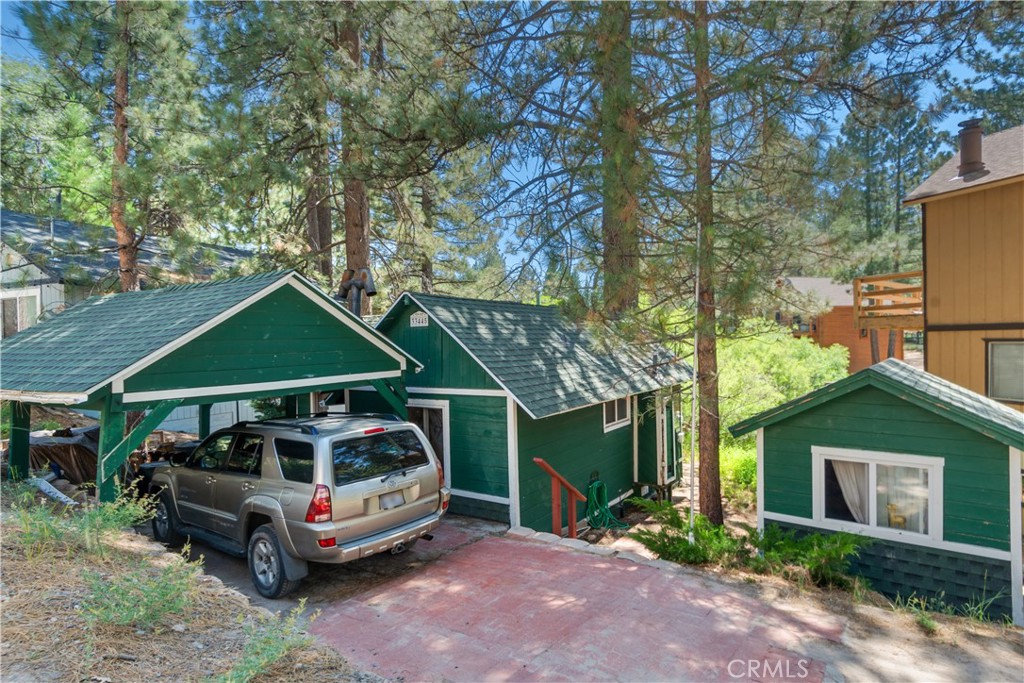 Tucked in the peaceful mountain community of Green Valley Lake, this hidden gem offers the perfect escape—whether you’re seeking a serene full-time home, a weekend retreat, or a smart investment. Just a short stroll to the lake and village, you’ll have easy access to fishing, boating, swimming, kayaking, paddle boarding, and endless hiking and biking trails. Inside, you’ll find new carpet and tile flooring, creating a fresh and cozy vibe. And out back? A charming bonus cabin that’s perfect for storage or a playhouse. Surrounded by the natural beauty of the San Bernardino Mountains, and just a quick drive to Snow Valley, Big Bear, and Sky Park at Santa’s Village, this is mountain living at its best. Come up, breathe deep, and stay awhile.