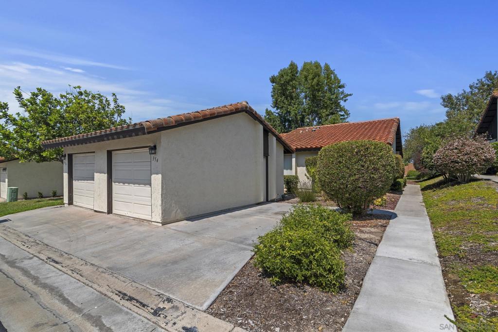Beautiful 55+ community in Encinitas with so much to offer! 3 spacious bedrooms, 2 full baths, a quiet location with an enclosed, covered, concrete patio overlooking the beautiful greenbelt too. New carpet and paint, very clean and move in ready. Detached one car garage with extra storage above, and a designated parking space next to the garage on a cul-de-sac location. The community features, movie nights, social events, a golf course, pool, pickle ball, and more. What a great place to retire to and enjoy! Come and take a look today! Equipment: Garage Door Opener, Range/Oven Sewer: Sewer Connected Topography: LL