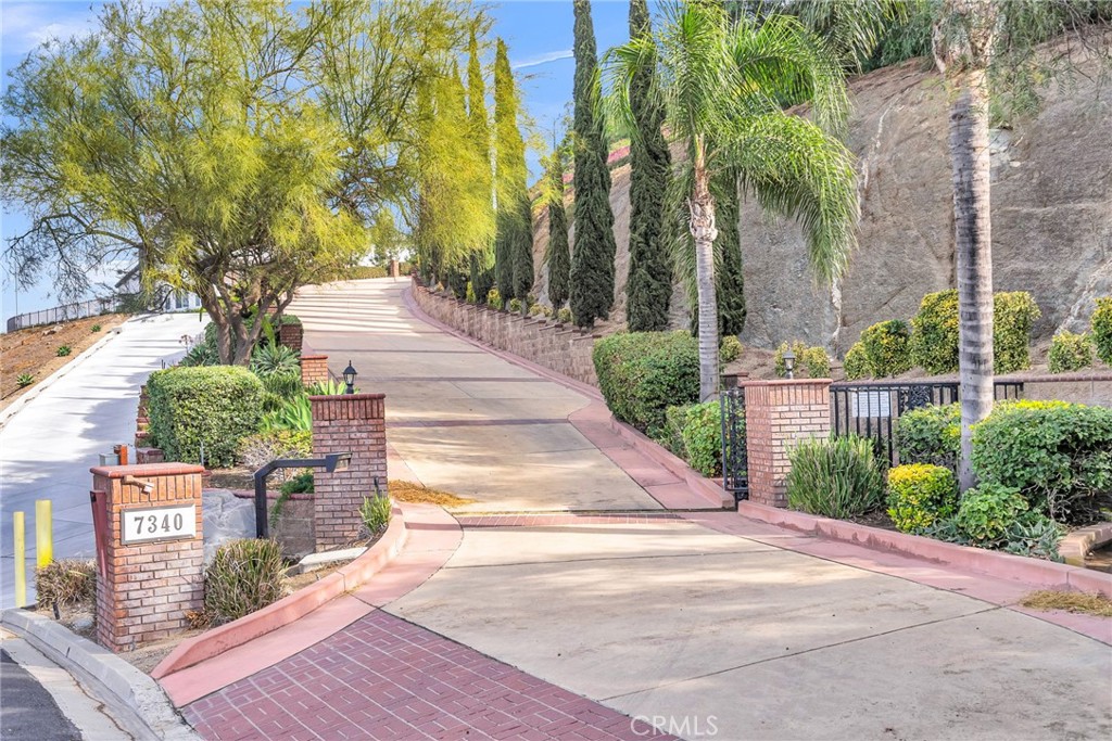 Don't miss this OPPORTUNITY! 5 Bedrooms/4.5 Baths ***5670SF*** 5.45 Acre lot***360 Degree City Lights, Mountain VIEWS***Gated Community*** Plus Private Gated Drive***SOLAR System Included***Elevator to 2nd Floor***6 Car RV Garage w 11' Doors*** Attached Workshop w Bath***Down Master Suite***Large Laundry room***Circular Sunroom***Bonus room***Formal Living & Dinning***Separate Family room***Family Eating area***Gourmet Kitchen***Island Cooktop***Double Ovens***All the Normal Built-in-Appliances***Wet Bar***Office***Solid Red Oak Cabinets***Formal Entry***Guest Powder Room***Wrap Around Balcony***Emergency Generator***Brick Drive to this Hilltop Home***Circular Drive was Previously Used as a Helicopter Pad. Wow! This and so much more!