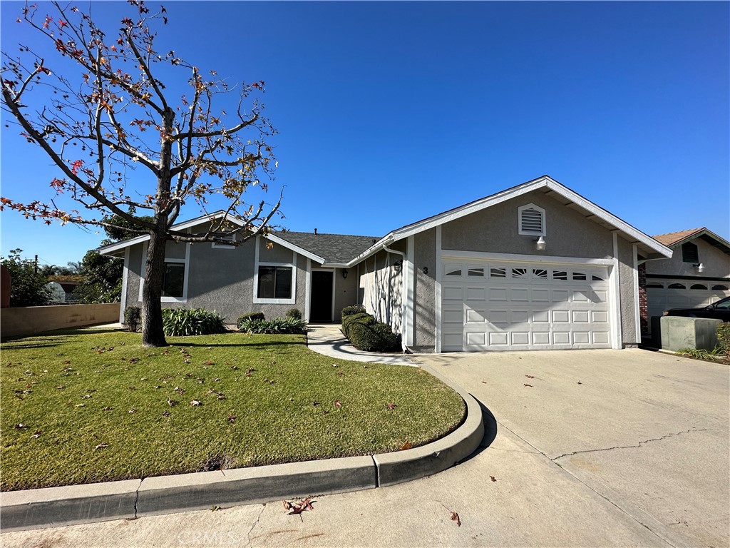 This charming, newly remodeled 3 bedroom & 3 bath, single family home is located on a private street in Azusa. Featuring new luxury vinyl flooring, new carpets, beautiful new kitchen with quartz counter tops and a new stainless steel sink and fixtures, new stainless steel 5 burner stove and hood. The large master bedroom features vaulted ceilings with plenty of closet space, private en suite updated with quartz and glazed tile/tub. There is an inside laundry room that leads to an attached 2 car garage with 2 additional assigned parking spots, built-in garage shelving and workbench. New roof and new exterior/interior paint. Extra bonus; Central heat and A/C, double pane windows, storage space galore, private patio and plenty of outdoor yard space to enjoy a peek-a-boo view of the mountains. New fencing and landscaping around the backyard and side yards are currently in the works. Move in ready!