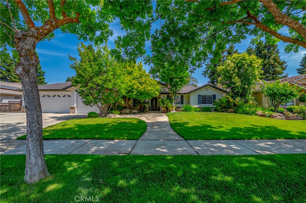 Welcome to your dream home in the highly desirable Mansionette subdivision! This beautifully maintained single-story residence offers privacy with 4 spacious bedrooms and 3 full bathrooms, perfectly blending comfort, functionality, and style. Exterior of home was recently painted. Ideal location just off Yosemite Avenue, with easy access to shopping, dining, public transportation, schools, and a nearby hospital. Vaulted ceilings and abundant natural light, skylights in the kitchen and living room. Updated appliances, new kitchen and dining hardware and refinished kitchen cabinets! Dual HVAC systems. The thoughtfully designed layout features a large master suite complete with a cozy fireplace, a luxurious soaking tub, double sinks, and generous closet space.
The 4th bedroom offers private access through the 3-car garage, making it perfect for guests, a home office, or a multi-generational living setup.
Entertain or unwind in a private backyard oasis that was recently renovated in 2022, complete with a sparkling in-ground pool, heated spa, LED lights, BBQ area with fridge and music! Pool equipment was replaced within the last year as well!
Additional features include ample storage throughout, a spacious living and dining area, and three-car garage for extra space and convenience.
Don’t miss this rare opportunity to own a versatile and elegant home in one of the area's most coveted neighborhoods!