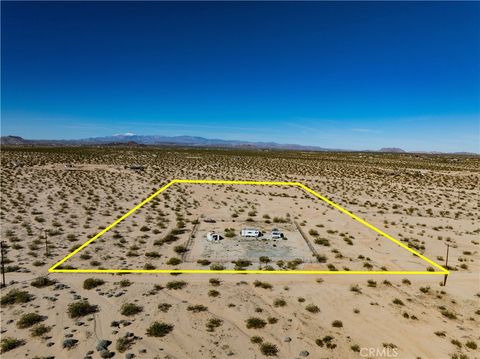 Photo of 1188 Mile Square Rd, Joshua Tree, CA 92252 (MLS # JT26048324)