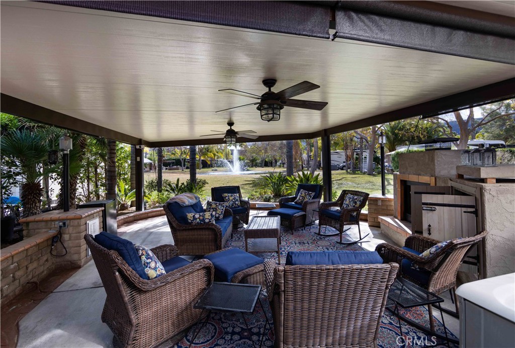 One of the best water views in the resort, a must see when visiting. Full Gorgeous Allumawood Cover overlooking back yard and Pond with Fountain, Gargantuan Family Room with Fireplace, TV Nook and sitting wall for extra visitors. The BBQ Island has a great patio and sitting area to enjoy company and lots of room for food or games. Huge Stained concrete area for Golf Cart parking or extra car. Looking for an RV Resort lot with space and privacy then come check out this perfect location nestled among the foothills of Palomar Mountain, minutes from Temecula Wine Country as well as a convenient location to Palm Springs in just under an hour, 1.5 hrs to San Diego and 1 hr to the beach in Oceanside. Rancho California RV Resort provides amenities such as a 14 hole Executive PAR 3 Golf Course (no fees for owners), 5 Pools/Jacuzzis, Tennis courts, Pickleball courts, Dog park, Club house, hiking trails, Horseshoe lawn and onsite grocery market. The resort is guard gated with no age restrictions. Monthly HOA fee includes use of the golf course, amenities, trash pickup at lot, water/sewer and common area maintenance. If you are considering a premier Southern California RV destination, don't miss out on visiting Rancho California RV Resort - Financing Available, schedule a showing today!