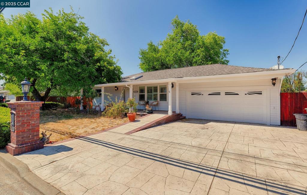 Welcome to this beautifully remodeled Concord gem! This charming home features a brand-new kitchen and bathroom, fresh paint, and stylish new flooring throughout, creating a modern and move-in-ready space. Enjoy relaxing on the quaint front porch with picturesque views of Mt. Diablo, or entertain in the expansive backyard with a huge side yard and RV parking—perfect for outdoor living and extra storage needs. Conveniently located near 12 years of schools, Cal State East Bay, BART, shopping, and just minutes from Walnut Creek, this home offers both comfort and accessibility.