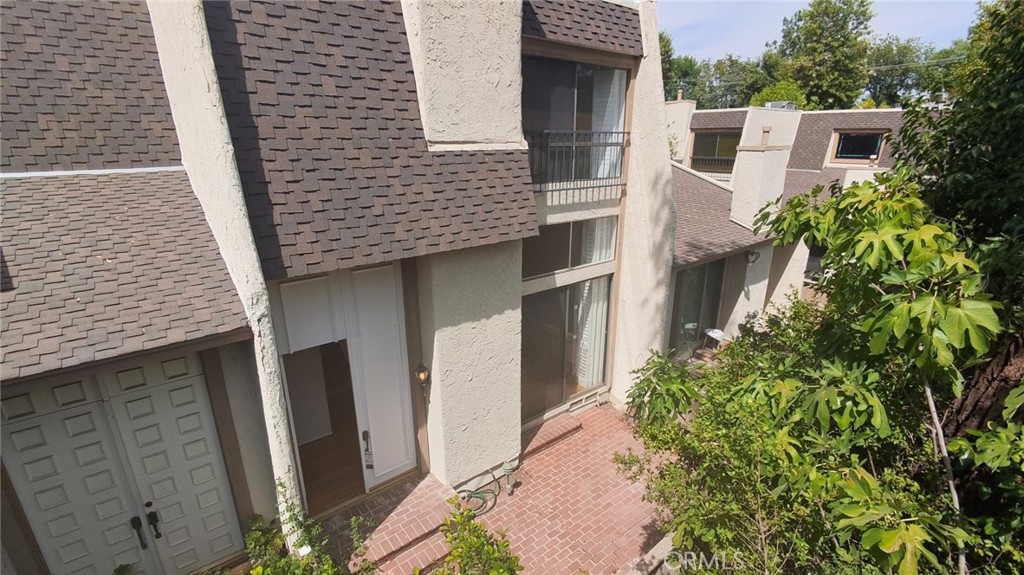 Spacious and updated 3-bed, 3-bath condo in the desirable Dove Creek community. This light-filled unit features an open-concept layout, updated kitchen with breakfast bar, in-unit laundry, and a private patio. The third bedroom has been opened up and converted into a loft, but can easily be enclosed again if desired. The primary suite offers a large closet and ensuite bath. Enjoy resort-style amenities including a pool, spa, tennis courts, and gated parking. Conveniently located near shopping, dining, parks, and top-rated schools in Woodland Hills.