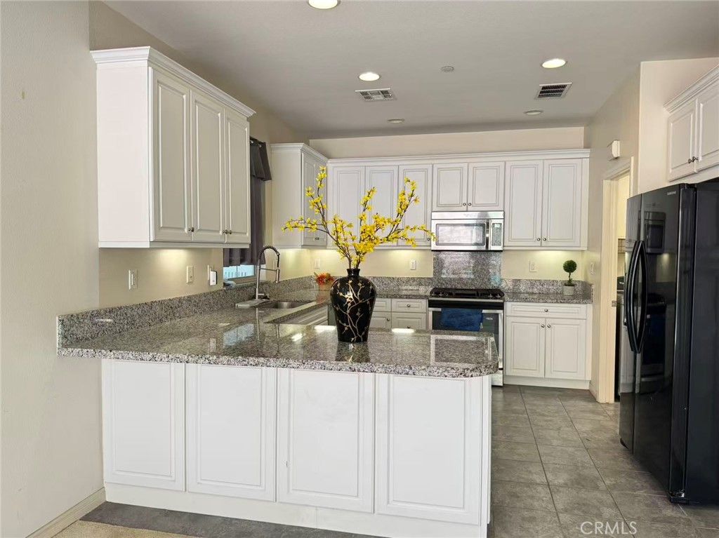 Photo of 231 Bright Poppy, Irvine, CA 92618 (MLS # WS26033912)