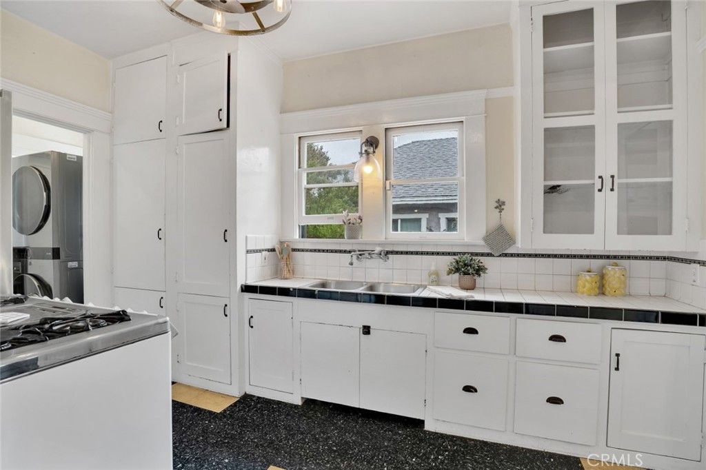 Photo of 2102 Hillcrest Drive, Los Angeles, CA 90016 (MLS # BB25227054)