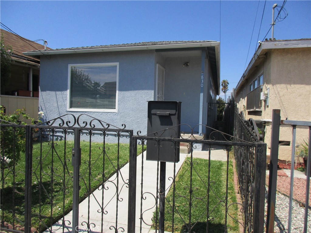 2 bedroom home with 1 3/4 bathrooms. Hardwood floors. Central air conditioning. Washer and dryer hookups in large attached 2-car garage.